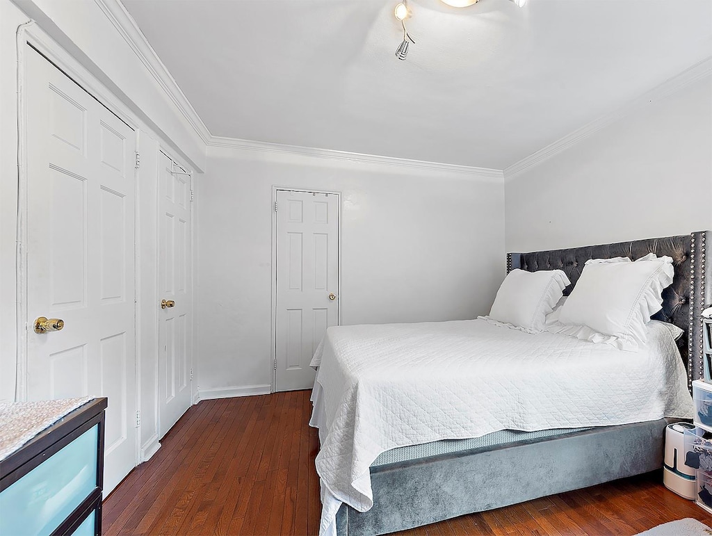 4523 Broadway Ave Unit 7D, New York Manhattan, NY 10040 - bedroom with crown molding and wood finished floors