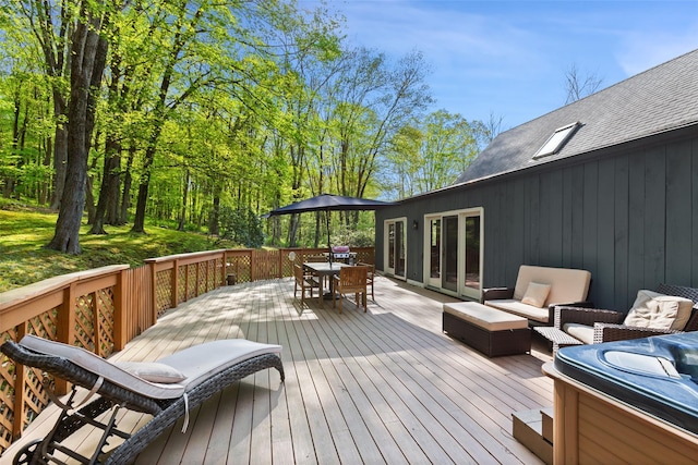 wooden deck with outdoor dining space