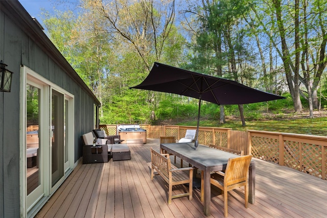 wooden deck featuring outdoor dining space