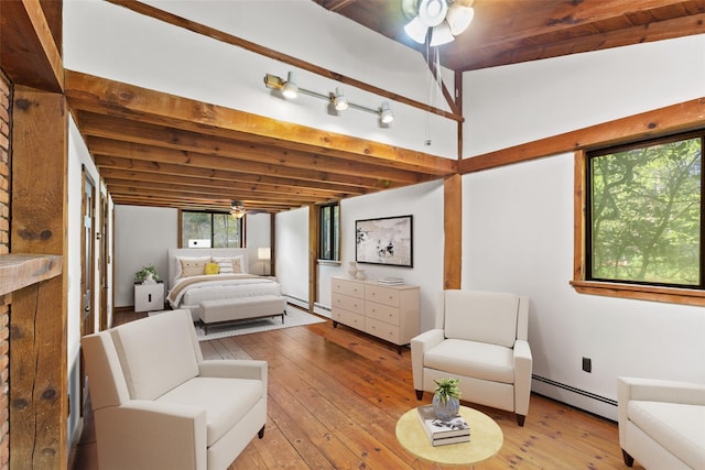 38 Waccabuc Rd, Goldens Bridge, NY 10526 - bedroom with a baseboard radiator, beam ceiling, and light wood-style floors