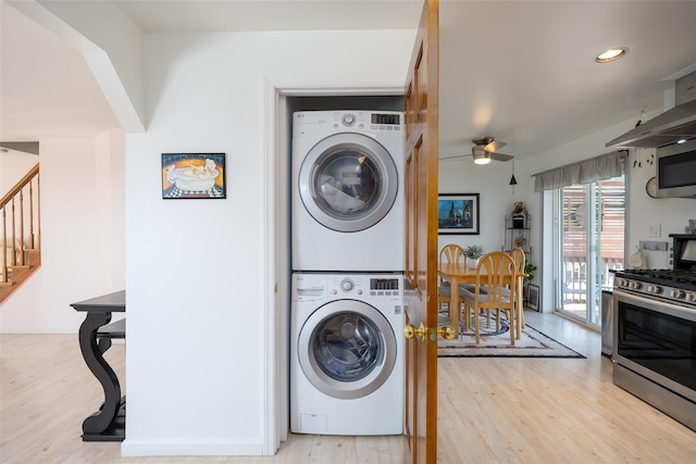 159 Araca Rd, Babylon, NY 11702 - clothes washing area featuring stacked washing machine and dryer, light wood-type flooring, ceiling fan, and recessed lighting