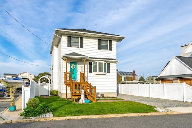 159 Araca Rd, Babylon, NY 11702 - view of front facade with a gate