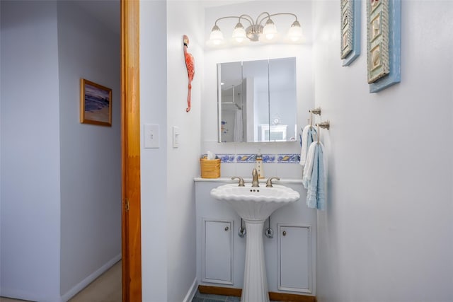 159 Araca Rd, Babylon, NY 11702 - bathroom with baseboards