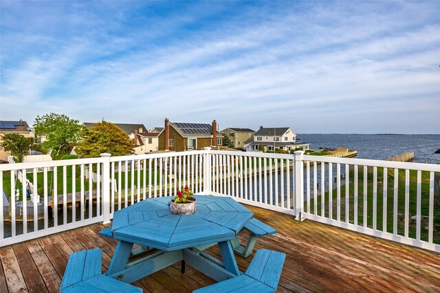 159 Araca Rd, Babylon, NY 11702 - deck with a water view, a residential view, and outdoor dining area