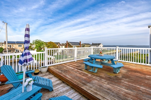 159 Araca Rd, Babylon, NY 11702 - deck featuring outdoor dining space and a water view