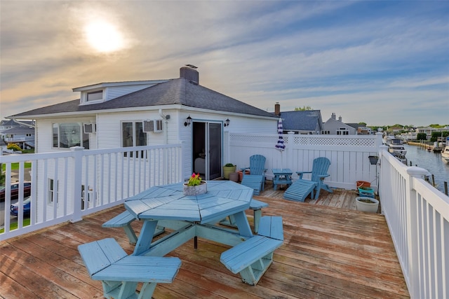 159 Araca Rd, Babylon, NY 11702 - wooden terrace with outdoor dining space and a water view