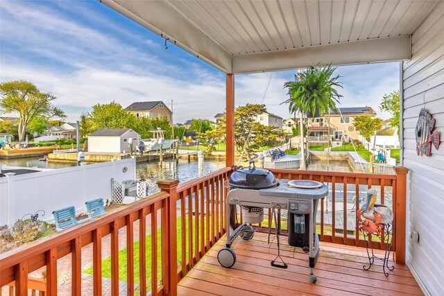 159 Araca Rd, Babylon, NY 11702 - wooden deck featuring a water view, a residential view, and a boat dock