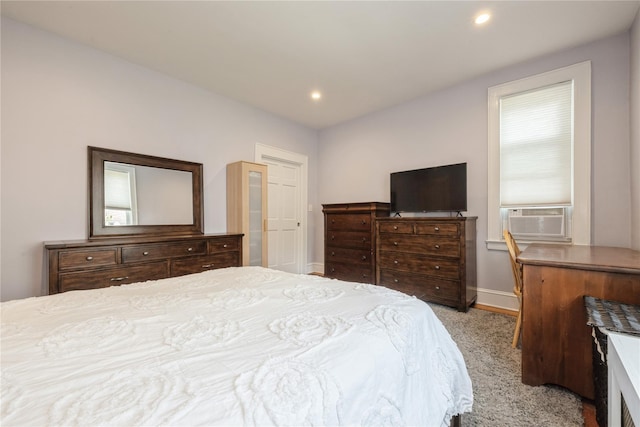 bedroom with light carpet, baseboards, cooling unit, and recessed lighting
