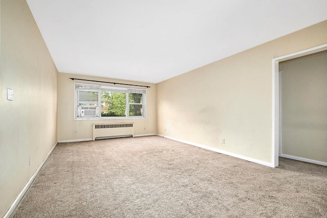 121 N Broadway # 31A, White Plains, NY 10603 - carpeted spare room with radiator heating unit and baseboards