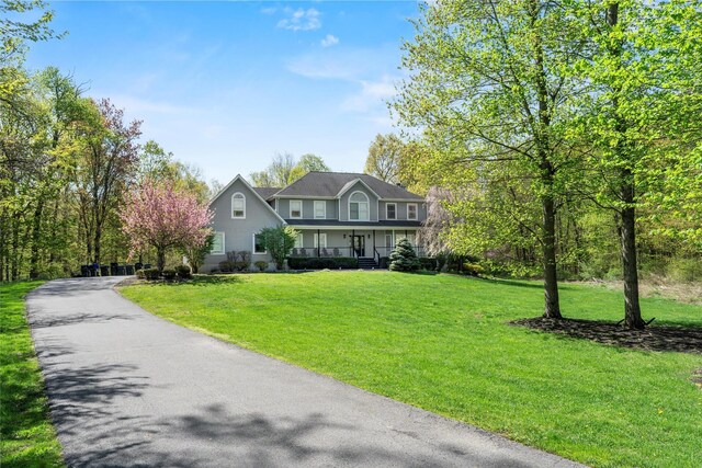 10-12 Damian Ct, Chester, NY 10918 - view of front of home with covered porch and a front yard