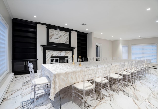 10-12 Damian Ct, Chester, NY 10918 - kitchen with built in shelves, light marble finish flooring, healthy amount of natural light, crown molding, and recessed lighting
