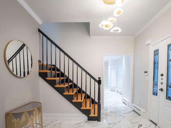 10-12 Damian Ct, Chester, NY 10918 - foyer featuring ornamental molding, marble finish floors, stairs, and baseboards