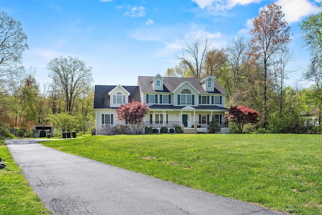 10-12 Damian Ct, Chester, NY 10918 - colonial house featuring a porch, a front lawn, an outdoor structure, and a shed