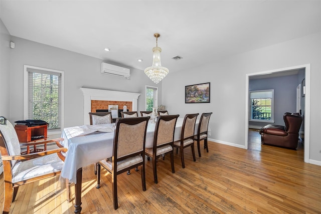 10-12 Damian Ct, Chester, NY 10918 - dining room featuring a wall mounted air conditioner, hardwood / wood-style flooring, plenty of natural light, and recessed lighting
