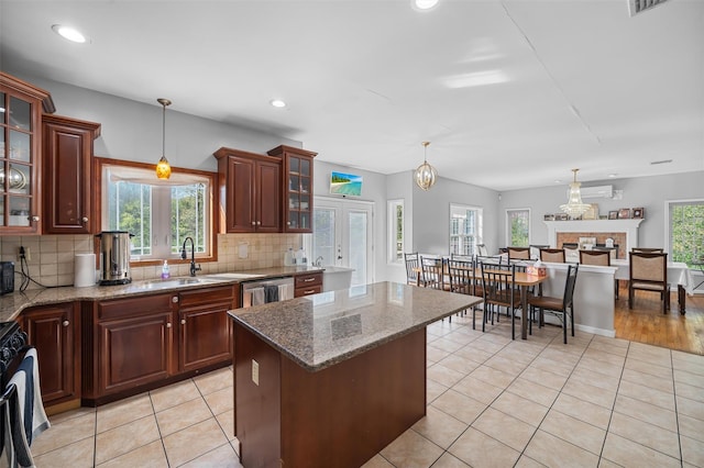 10-12 Damian Ct, Chester, NY 10918 - kitchen featuring stainless steel dishwasher, tasteful backsplash, decorative light fixtures, and recessed lighting