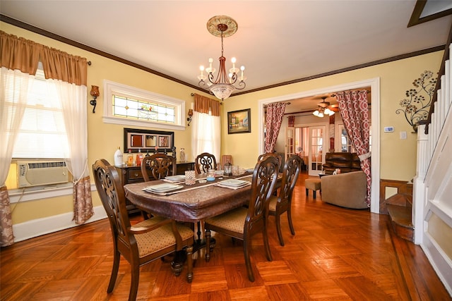 dining space featuring crown molding, baseboards, a chandelier, and cooling unit