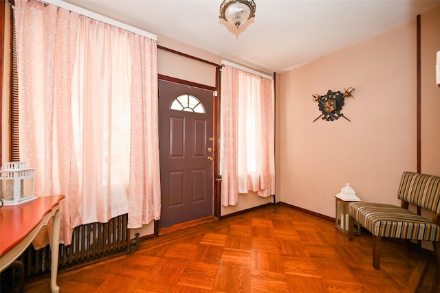 entrance foyer featuring baseboards