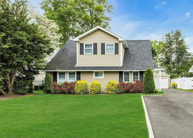 20 Robert Rd, Glen Cove, NY 11542 - view of front of property with a shingled roof, driveway, and an attached garage