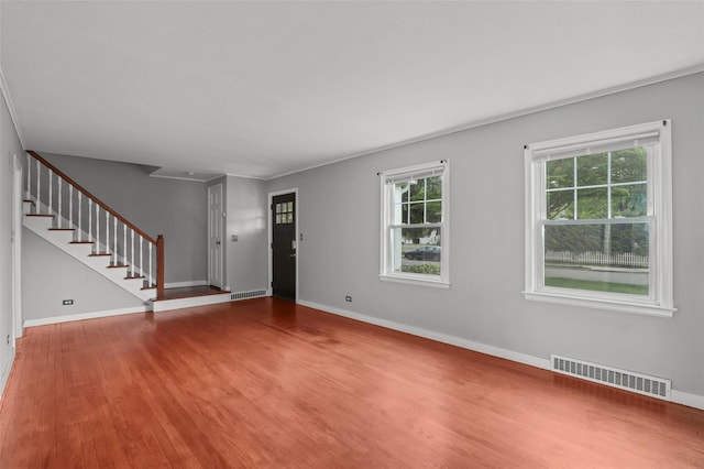 interior space with stairs, visible vents, and a wealth of natural light