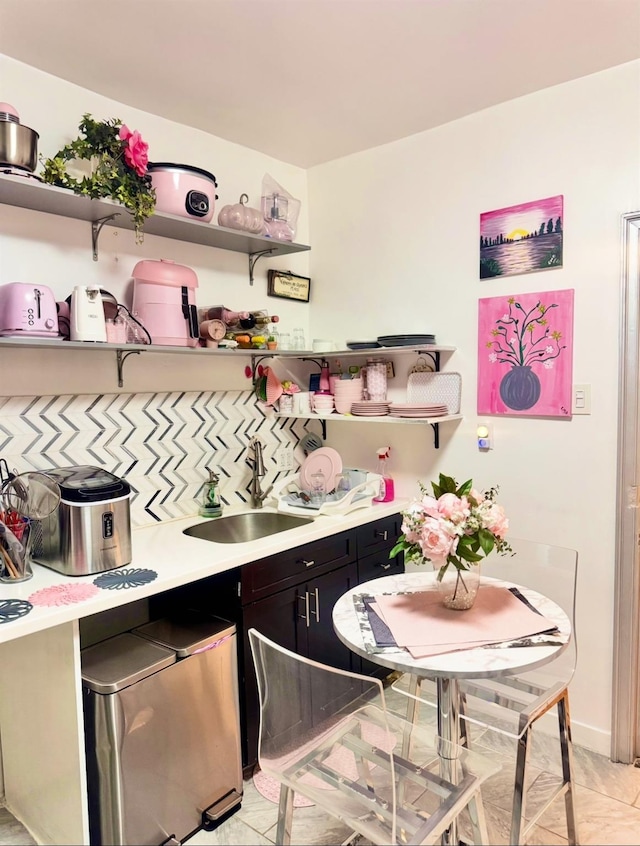 interior space with refrigerator and a sink