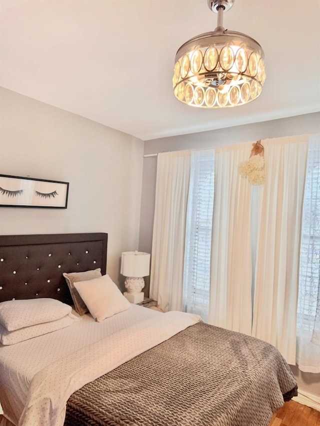bedroom featuring wood finished floors