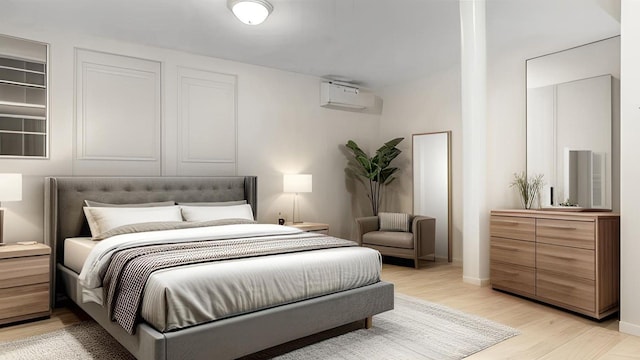 bedroom featuring a wall mounted AC and light wood-style flooring