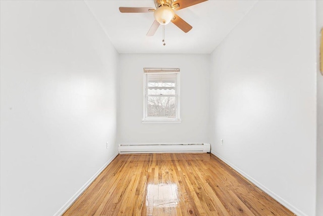 3135 Gunther Ave, Bronx, NY 10469 - unfurnished room featuring baseboards, ceiling fan, baseboard heating, and light wood finished floors