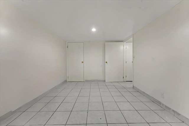 3135 Gunther Ave, Bronx, NY 10469 - empty room with light tile patterned floors and recessed lighting