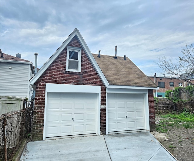 detached garage with fence