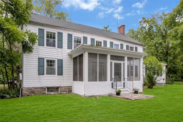711 Homestead Ave, Maybrook, NY 12543 - rear view of property with a chimney, a sunroom, and a lawn
