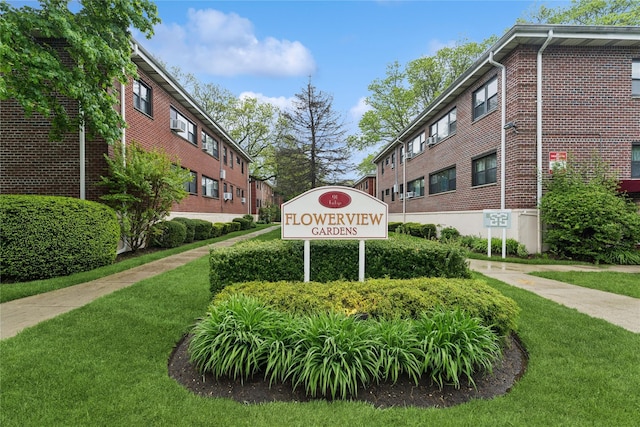 91 Tulip Ave Unit B1, Cartion, Floral Park, NY 11001 - community / neighborhood sign featuring a yard