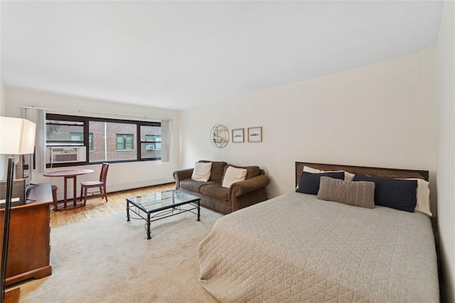 91 Tulip Ave Unit B1, Cartion, Floral Park, NY 11001 - bedroom with wood finished floors and cooling unit