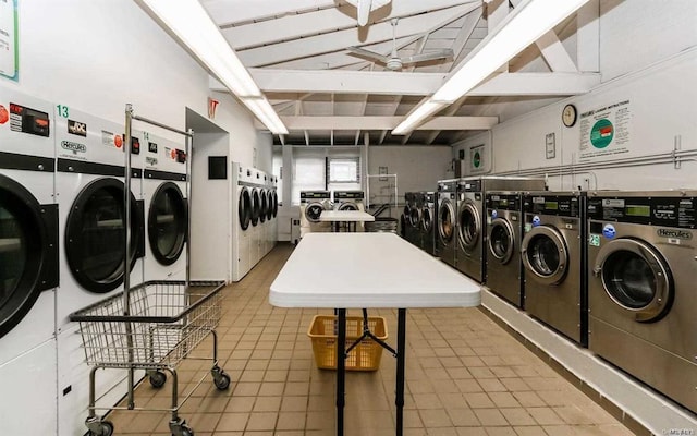 91 Tulip Ave Unit B1, Cartion, Floral Park, NY 11001 - shared laundry room with washer and dryer and tile patterned floors