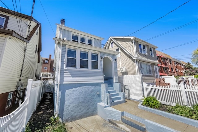 3399 Ely Ave, Bronx, NY 10469 - view of front of house featuring fence and a chimney