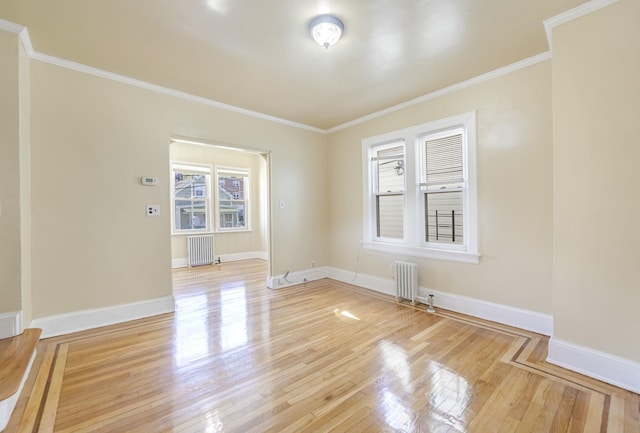 3399 Ely Ave, Bronx, NY 10469 - spare room featuring light wood-style floors, radiator heating unit, and crown molding
