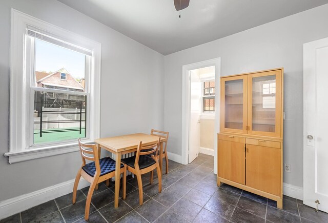 3399 Ely Ave, Bronx, NY 10469 - dining space featuring baseboards and a ceiling fan