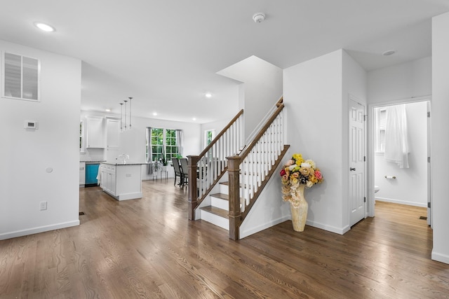 214 Phillips St, Middletown, NY 10940 - staircase with baseboards, recessed lighting, wood finished floors, and visible vents