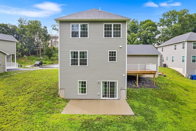 214 Phillips St, Middletown, NY 10940 - back of house with a lawn, a wooden deck, and a patio