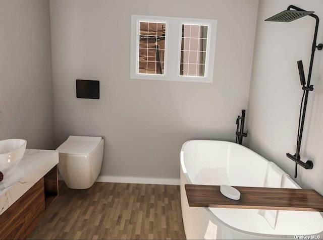 1 Breeze Hill Rd, Northport, NY 11768 - bathroom with wood finished floors, baseboards, vanity, toilet, and a soaking tub