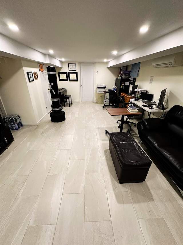 finished basement with recessed lighting and a wall unit AC