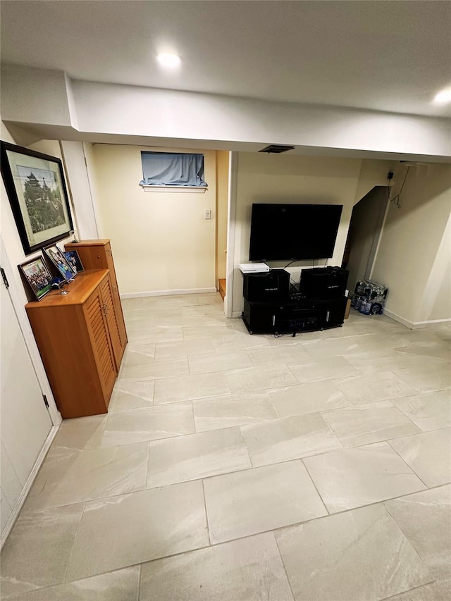 hallway featuring visible vents and baseboards