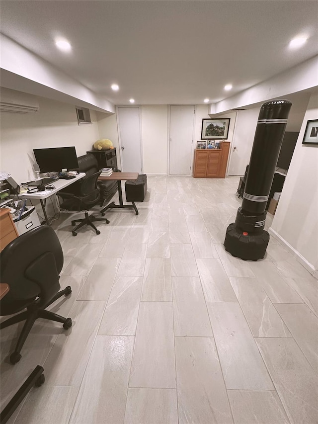 office with recessed lighting and visible vents