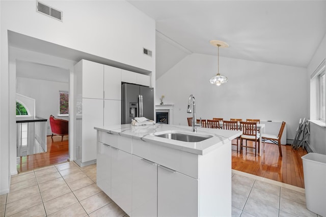 4 Sequoia Trl, Highland Mills, NY 10930 - kitchen featuring a sink, visible vents, a wealth of natural light, stainless steel fridge with ice dispenser, and modern cabinets