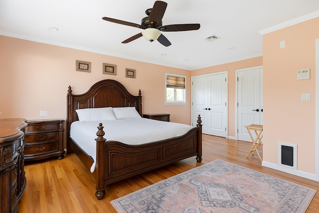 2035 Sans Ave, Merrick, NY 11566 - bedroom with visible vents, crown molding, and light wood-type flooring