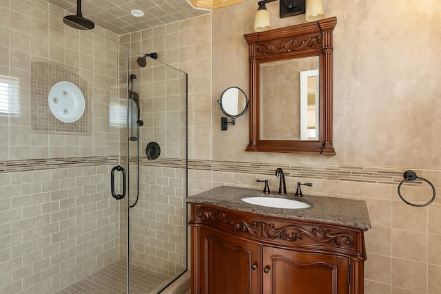 2035 Sans Ave, Merrick, NY 11566 - bathroom with vanity, a stall shower, and tile walls