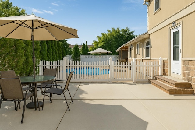 2035 Sans Ave, Merrick, NY 11566 - view of patio / terrace with fence, a fenced in pool, and outdoor dining space