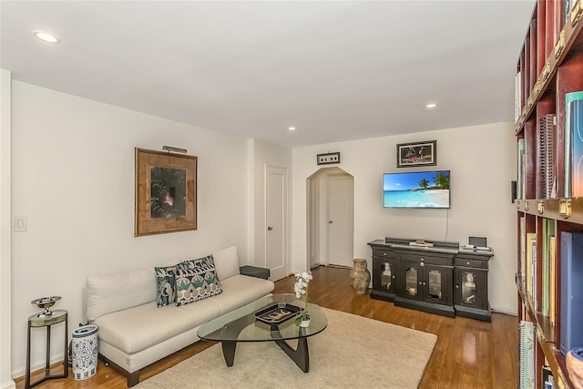 36-07 171st St Unit 36, Flushing, NY 11358 - living room featuring recessed lighting, arched walkways, and wood finished floors