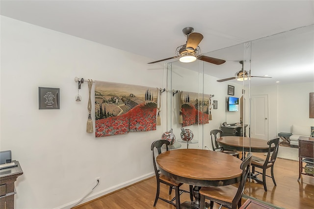 36-07 171st St Unit 36, Flushing, NY 11358 - dining area with a ceiling fan, baseboards, and light wood-style floors