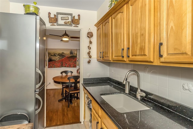 36-07 171st St Unit 36, Flushing, NY 11358 - kitchen with tasteful backsplash, light wood-type flooring, a sink, freestanding refrigerator, and dark stone countertops