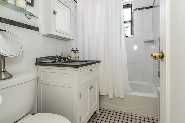 36-07 171st St Unit 36, Flushing, NY 11358 - bathroom with toilet, tile walls, shower / bath combo, and vanity